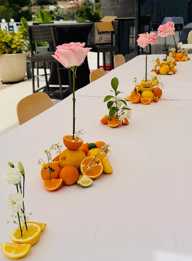 Centros de mesa con cítricos y rosas